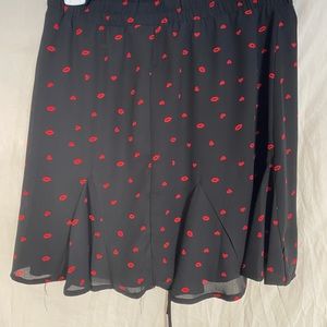 Brand new black skirt with heart and lips